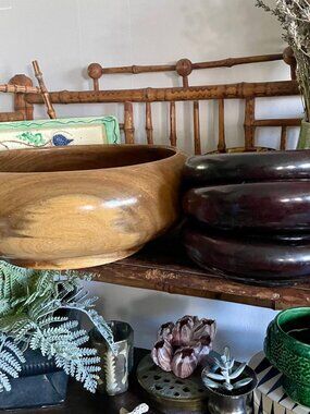 Vintage lot of 4 hand turned wooden bowls in warm brown tones.